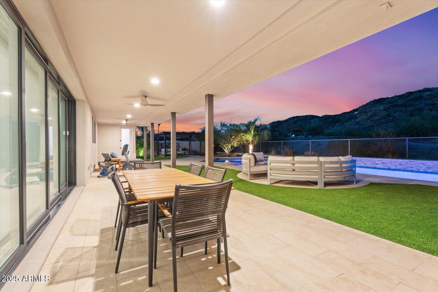 9527 South 13th Way Phoenix, AZ 85042 - Photo 29 of 44 a view of a swimming pool with a patio and a yard
