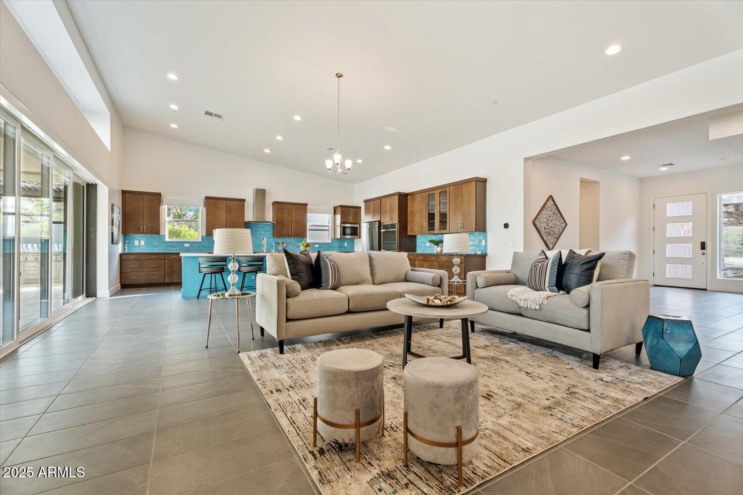 9527 South 13th Way Phoenix, AZ 85042 - Photo 7 of 44 a living room with furniture and a large window