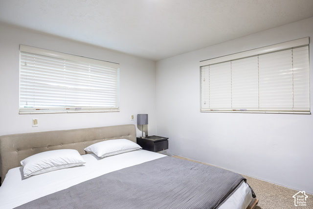 2727 Oneida Lane Provo, UT 84604 - Photo 12 of 26 Two windows with horizontal blinds and light-colored walls