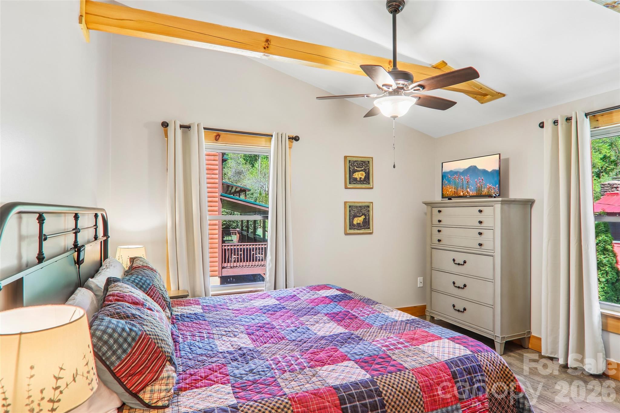 589 Panoramic Loop Maggie Valley, NC 28751 - Photo 31 of 47 a bedroom with a bed and a dresser