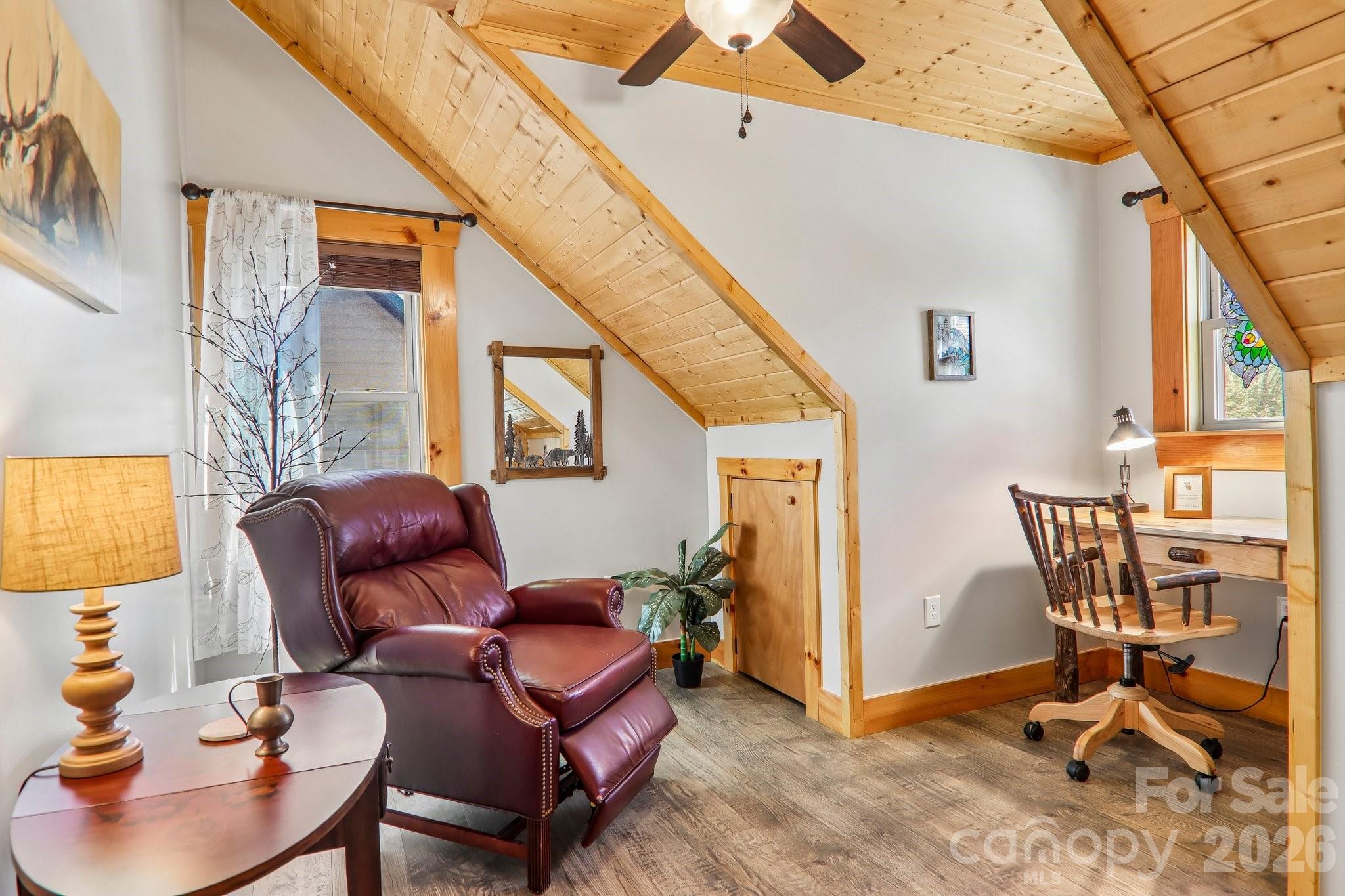 589 Panoramic Loop Maggie Valley, NC 28751 - Photo 35 of 47 a living room with furniture and a flat screen tv