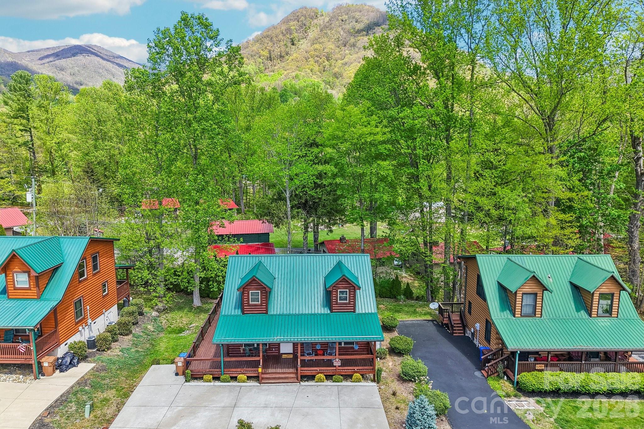 589 Panoramic Loop Maggie Valley, NC 28751 - Photo 43 of 47 swimming pool view with table and chairs