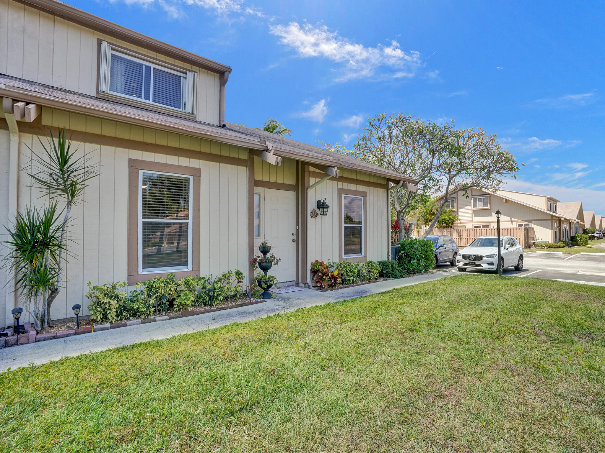 313 Maplecrest Circle Jupiter, FL 33458 - Photo 3 of 30 Townhouse Front
