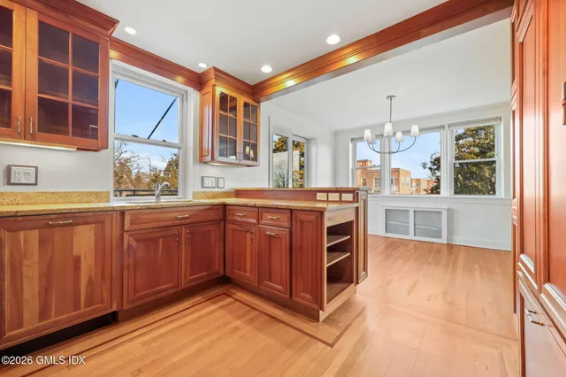 a view of a chairs and table in patio