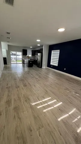 a view of empty room with a window