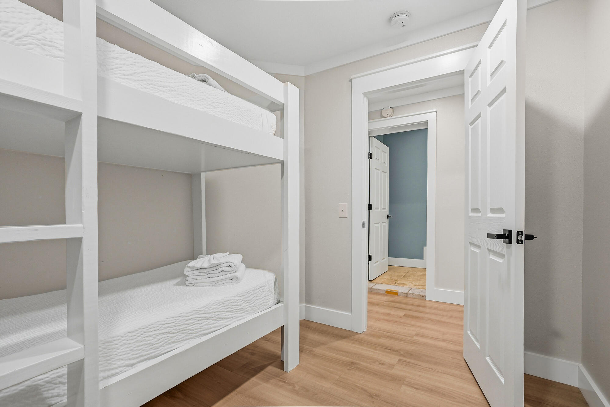 18 Initial Lane Santa Rosa Beach, FL 32459 - Photo 18 of 60 a view of a hallway with wooden floor and closet