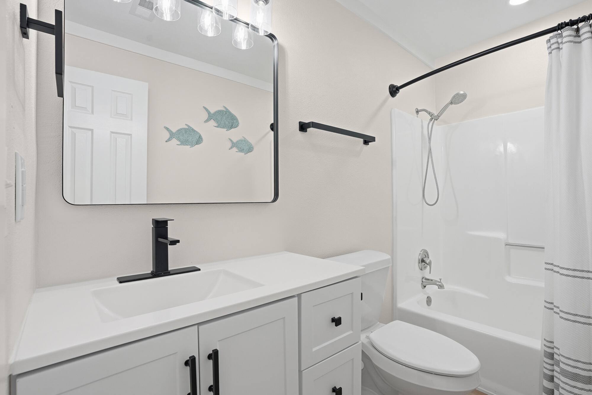 18 Initial Lane Santa Rosa Beach, FL 32459 - Photo 19 of 60 a bathroom with a sink a toilet and shower