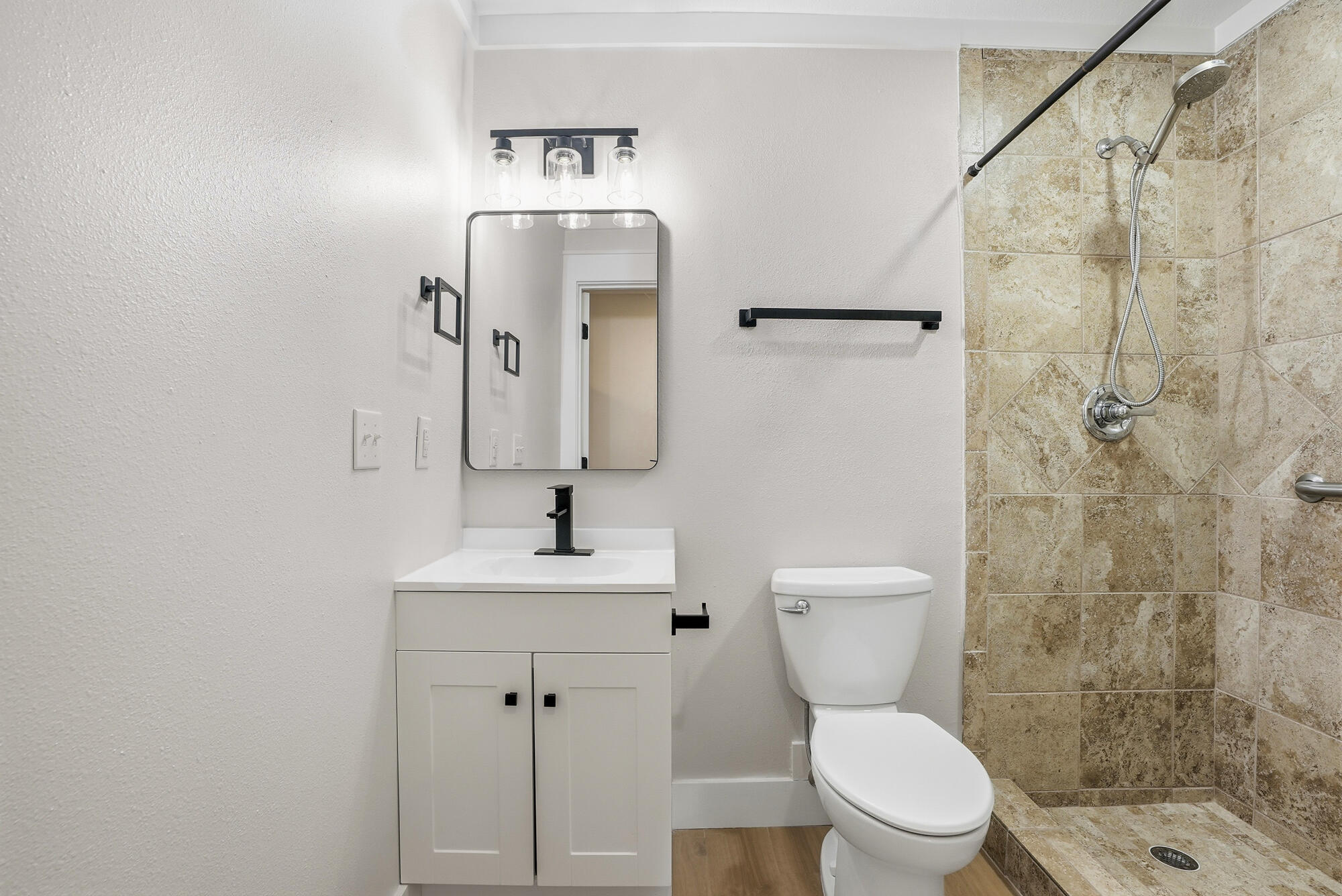 18 Initial Lane Santa Rosa Beach, FL 32459 - Photo 20 of 60 a bathroom with a toilet sink and shower