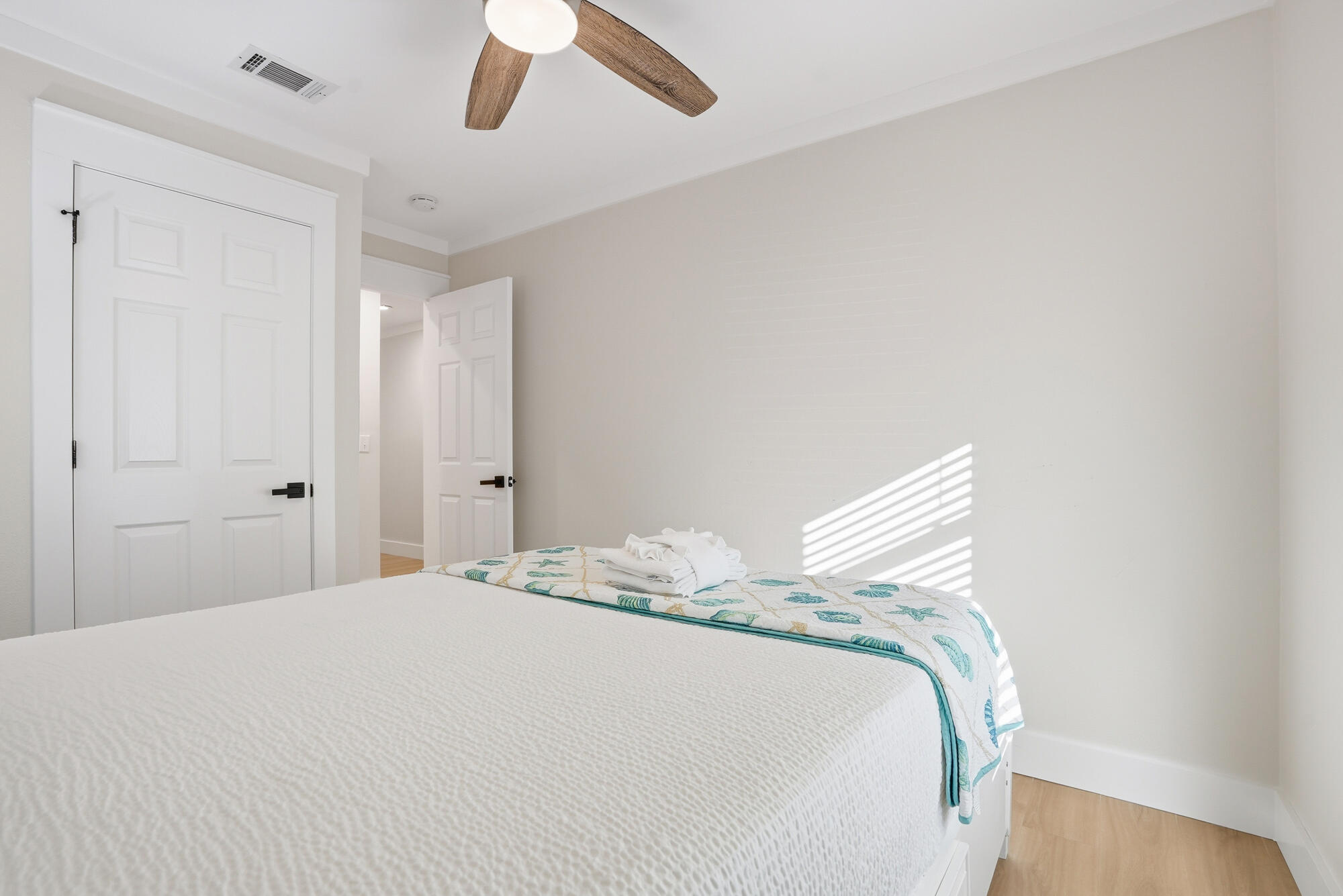 18 Initial Lane Santa Rosa Beach, FL 32459 - Photo 24 of 60 a bedroom with a bed and a window