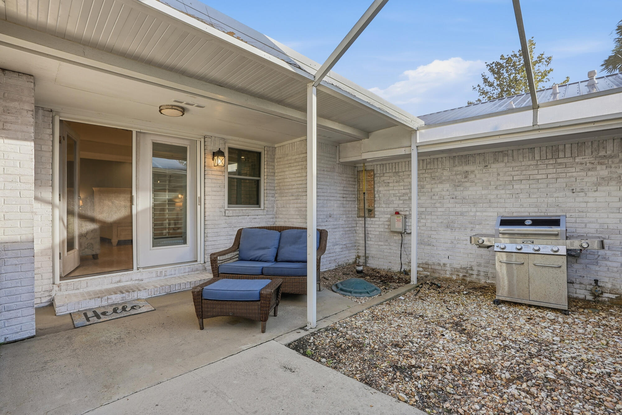 18 Initial Lane Santa Rosa Beach, FL 32459 - Photo 46 of 60 a living room with a couch and a stove