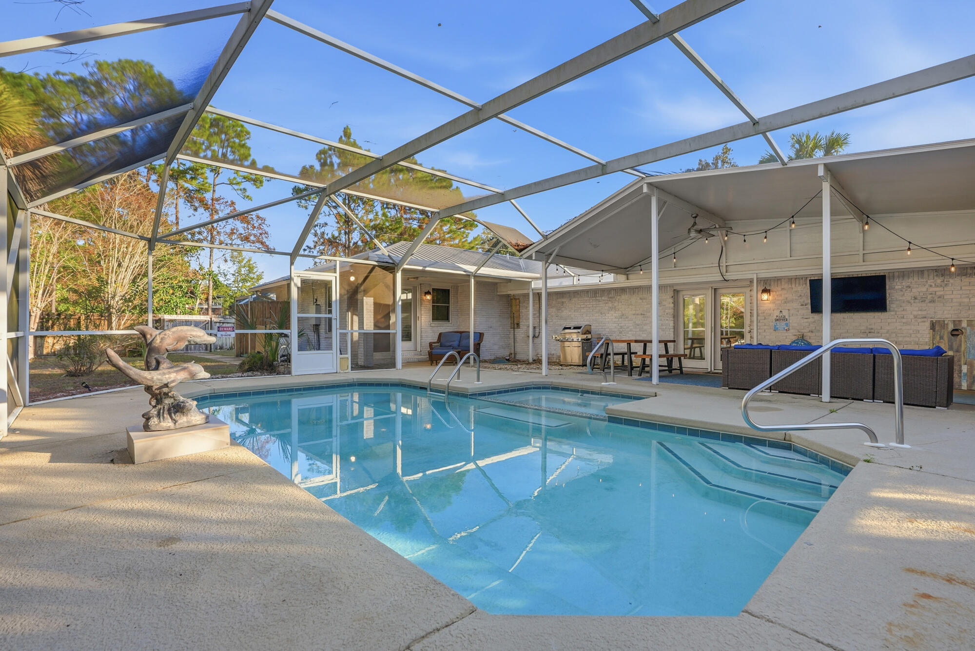 18 Initial Lane Santa Rosa Beach, FL 32459 - Photo 49 of 60 a view of a swimming pool with a patio