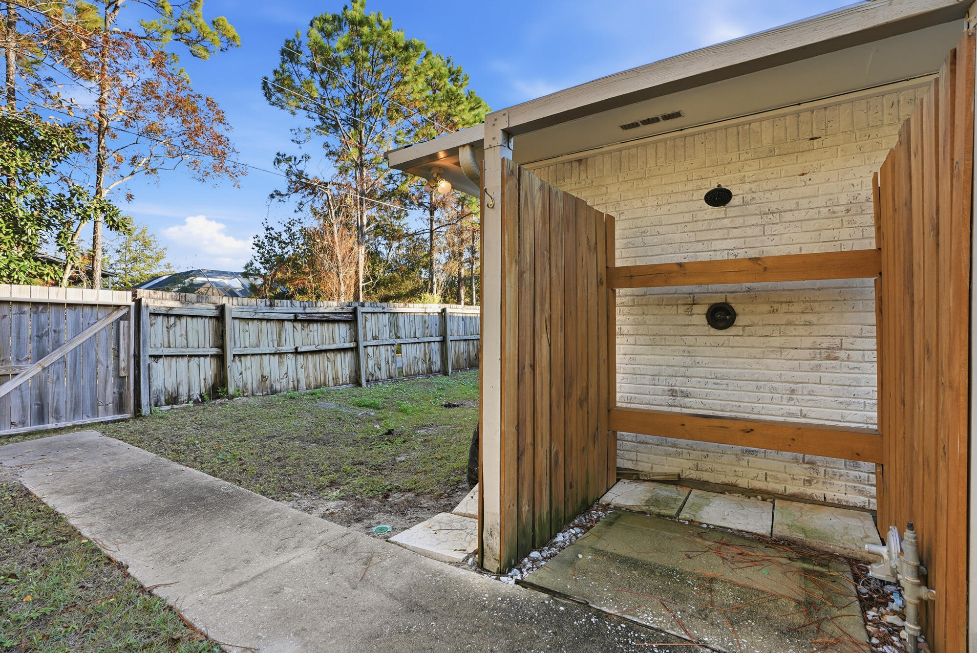 18 Initial Lane Santa Rosa Beach, FL 32459 - Photo 51 of 60 a front view of a house with a yard