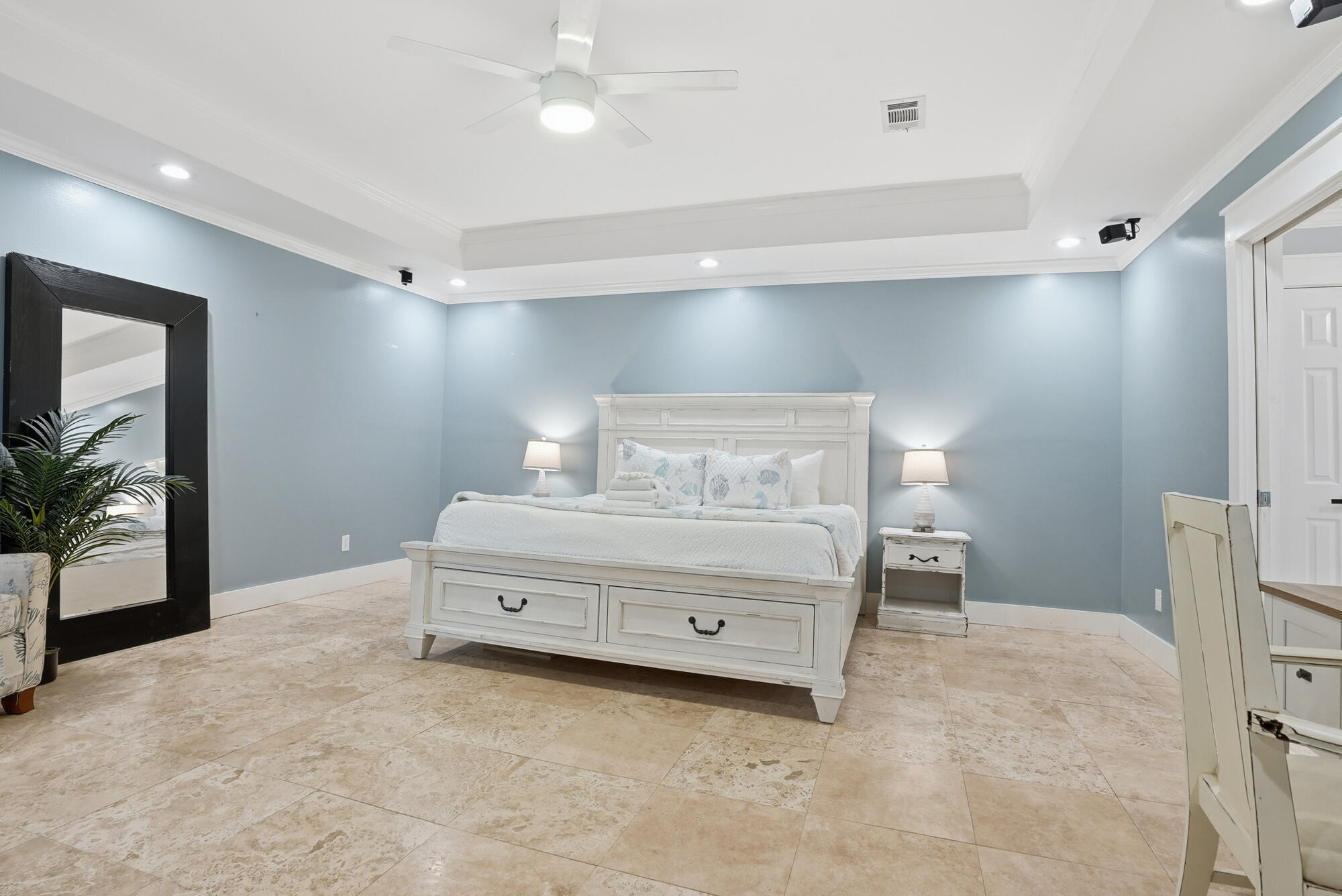 18 Initial Lane Santa Rosa Beach, FL 32459 - Photo 7 of 60 a room with a bed and a potted plant on the dresser