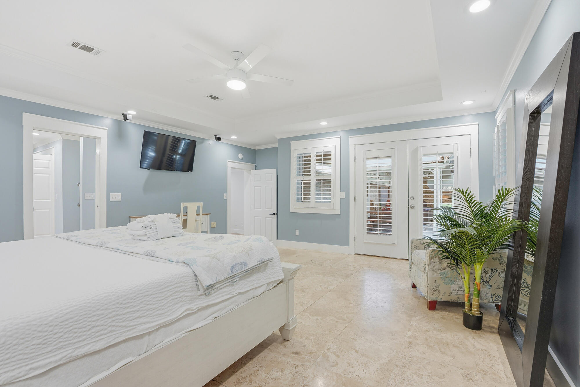 18 Initial Lane Santa Rosa Beach, FL 32459 - Photo 9 of 60 a spacious bedroom with a large bed and a potted plant