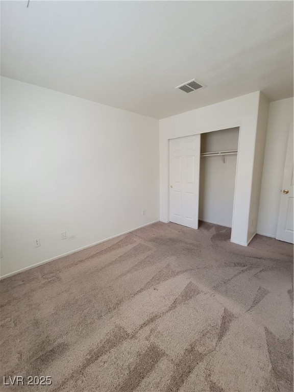 1112 Nevada Blaze Avenue North Las Vegas, NV 89081 - Photo 14 of 22 Unfurnished bedroom with carpet floors and a closet