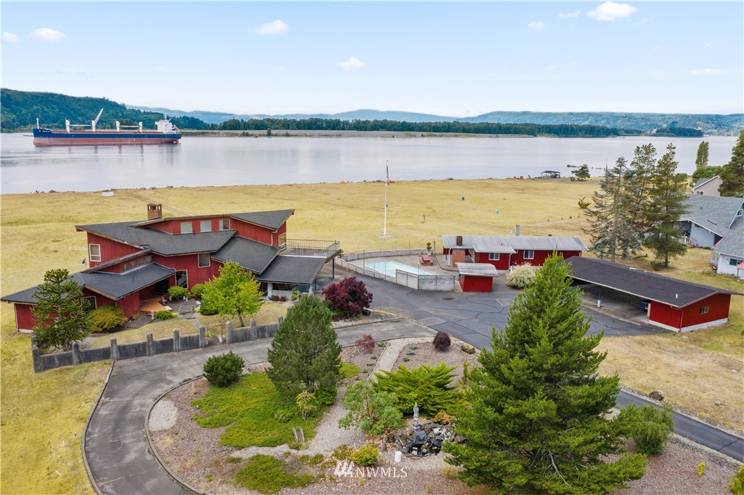 7461 Willow Grove Road Longview, WA 98632 - Photo 1 of 31 an aerial view of a house with a lake view