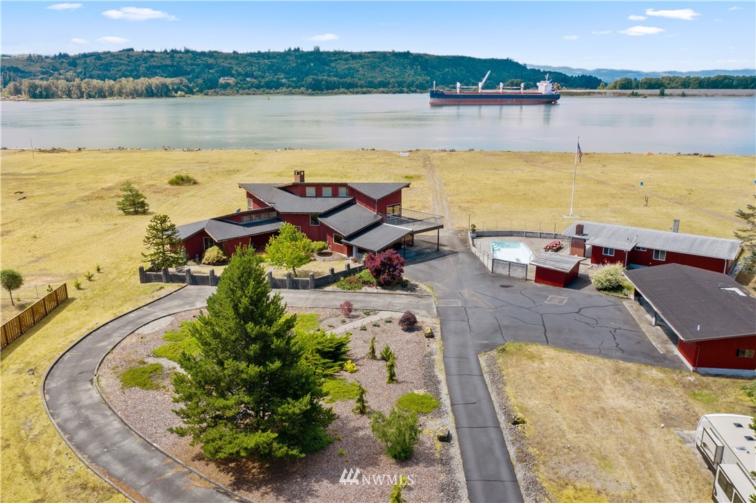 7461 Willow Grove Road Longview, WA 98632 - Photo 2 of 31 an aerial view of a house with a lake view