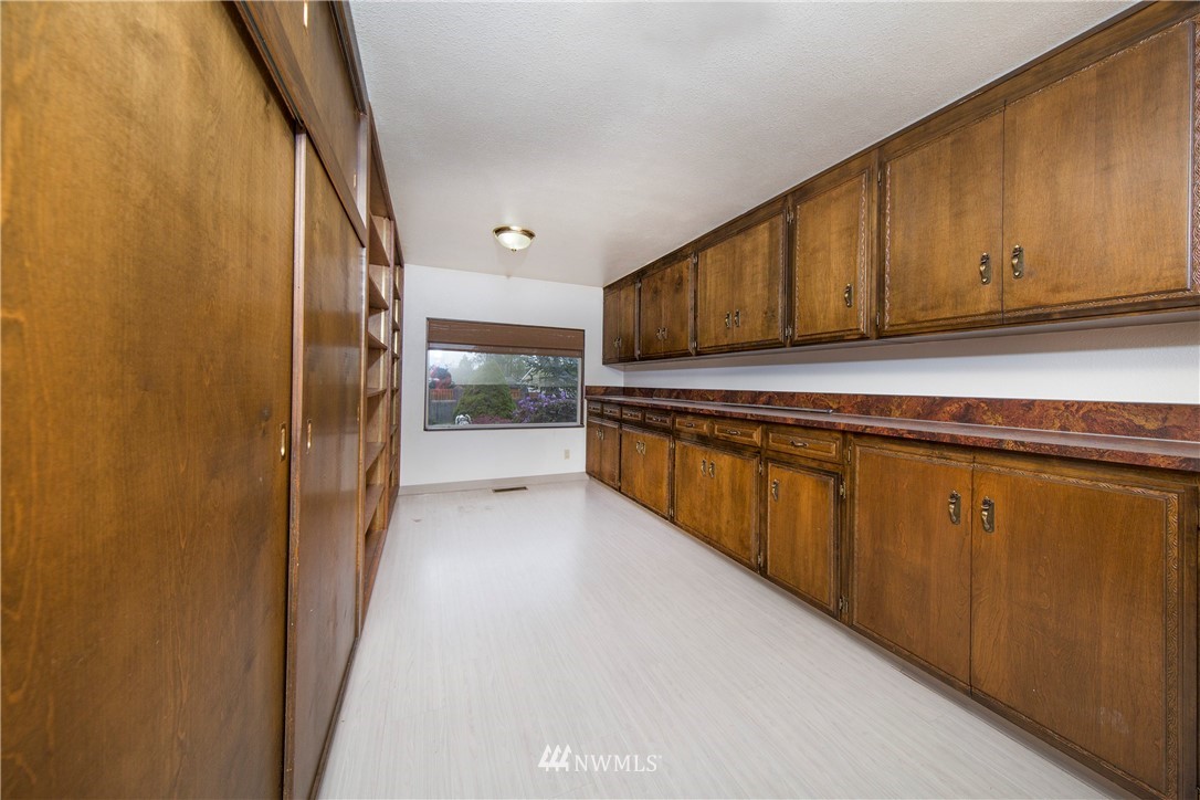 7461 Willow Grove Road Longview, WA 98632 - Photo 16 of 31 a view of a kitchen with wooden floor