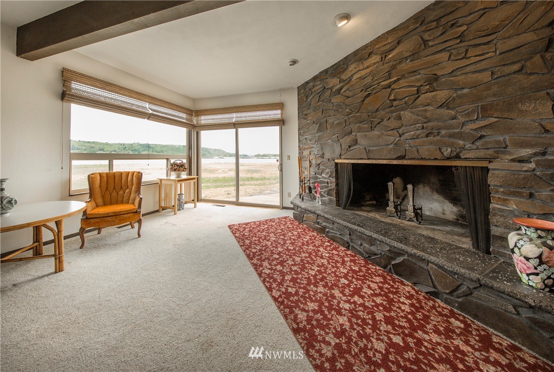 7461 Willow Grove Road Longview, WA 98632 - Photo 19 of 31 a living room with furniture and a fireplace