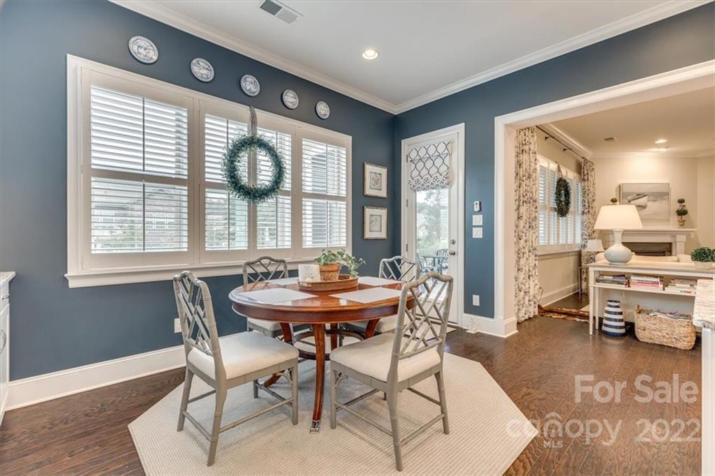 1489 Afton Way Fort Mill, SC 29708 - Photo 12 of 48 a view of a dining room with furniture and a large window