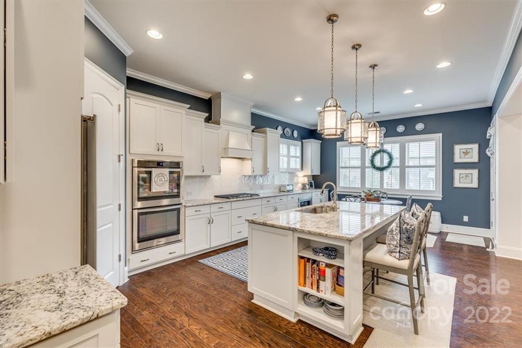 1489 Afton Way Fort Mill, SC 29708 - Photo 15 of 48 a kitchen with stainless steel appliances granite countertop a sink stove and refrigerator