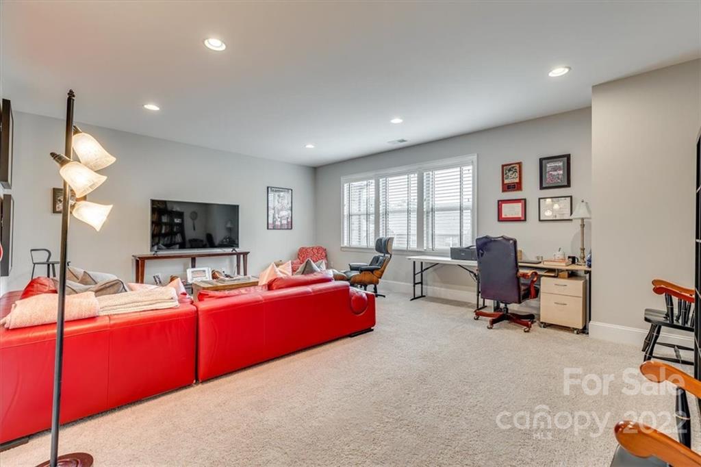 1489 Afton Way Fort Mill, SC 29708 - Photo 32 of 48 a living room with furniture and a flat screen tv