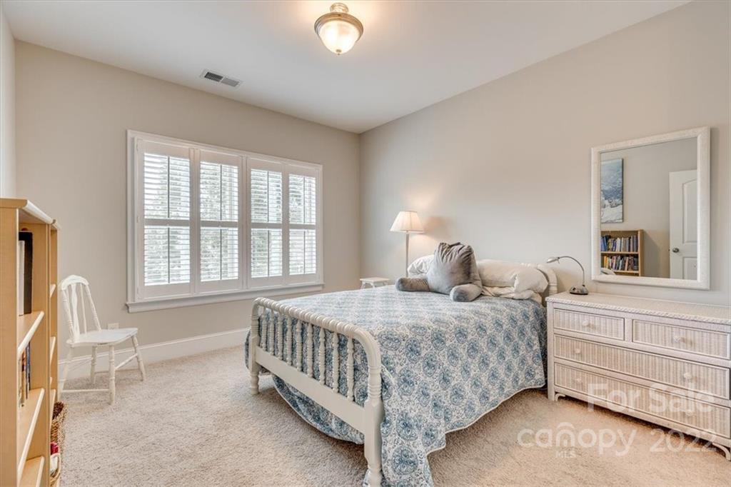 1489 Afton Way Fort Mill, SC 29708 - Photo 34 of 48 a bedroom with a bed and a window