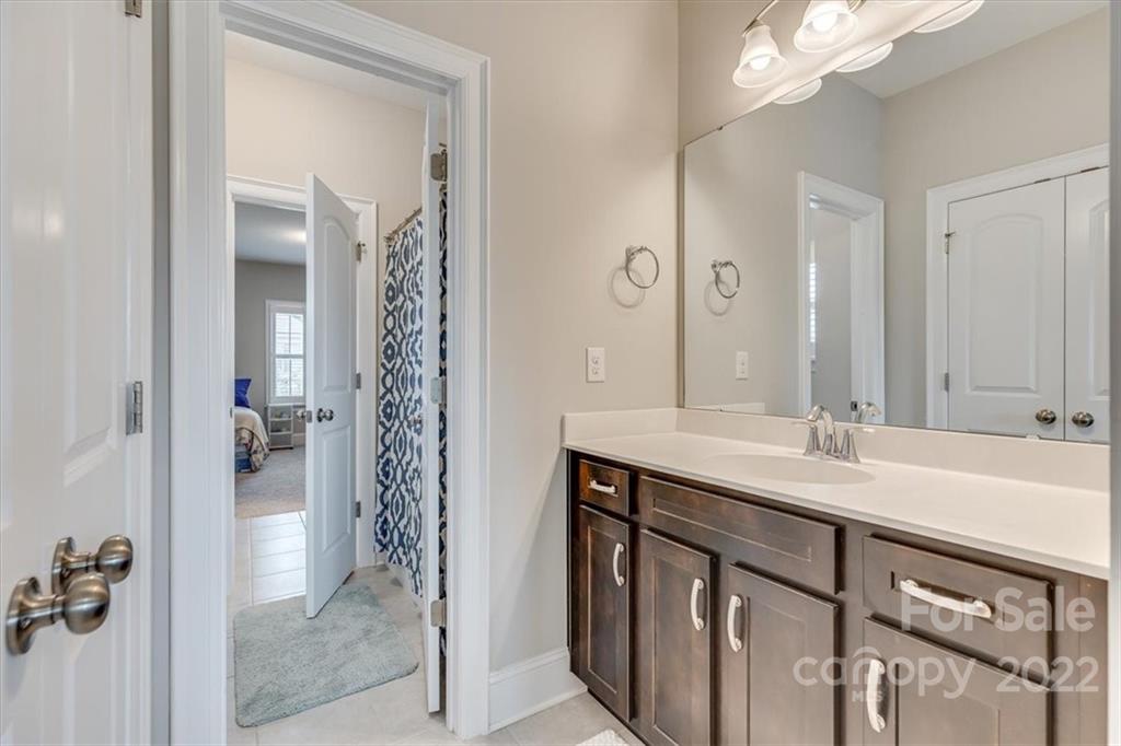 1489 Afton Way Fort Mill, SC 29708 - Photo 36 of 48 a bathroom with a sink and mirror