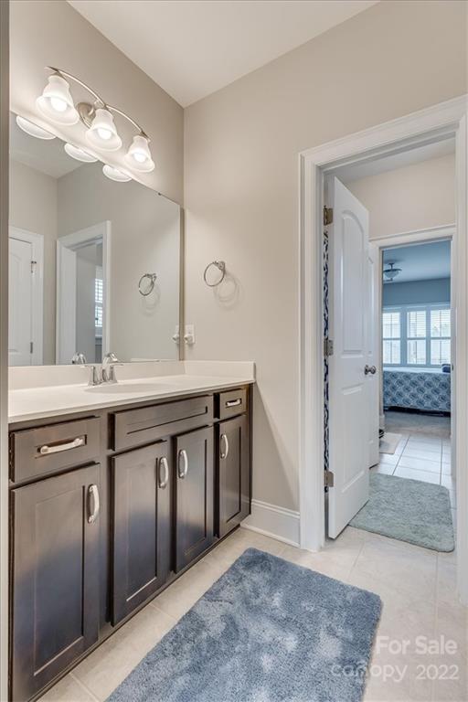 1489 Afton Way Fort Mill, SC 29708 - Photo 39 of 48 a bathroom with a double vanity sink and a mirror