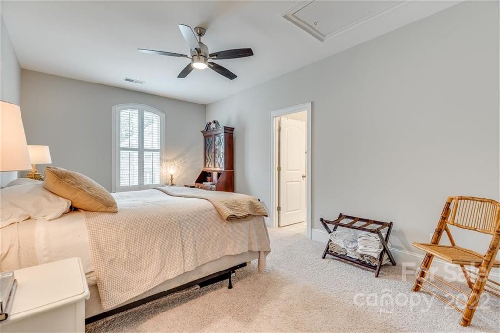 1489 Afton Way Fort Mill, SC 29708 - Photo 40 of 48 a bedroom with a bed a chair and window