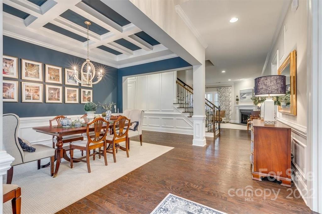 1489 Afton Way Fort Mill, SC 29708 - Photo 8 of 48 a dining room with wooden floor and large windows