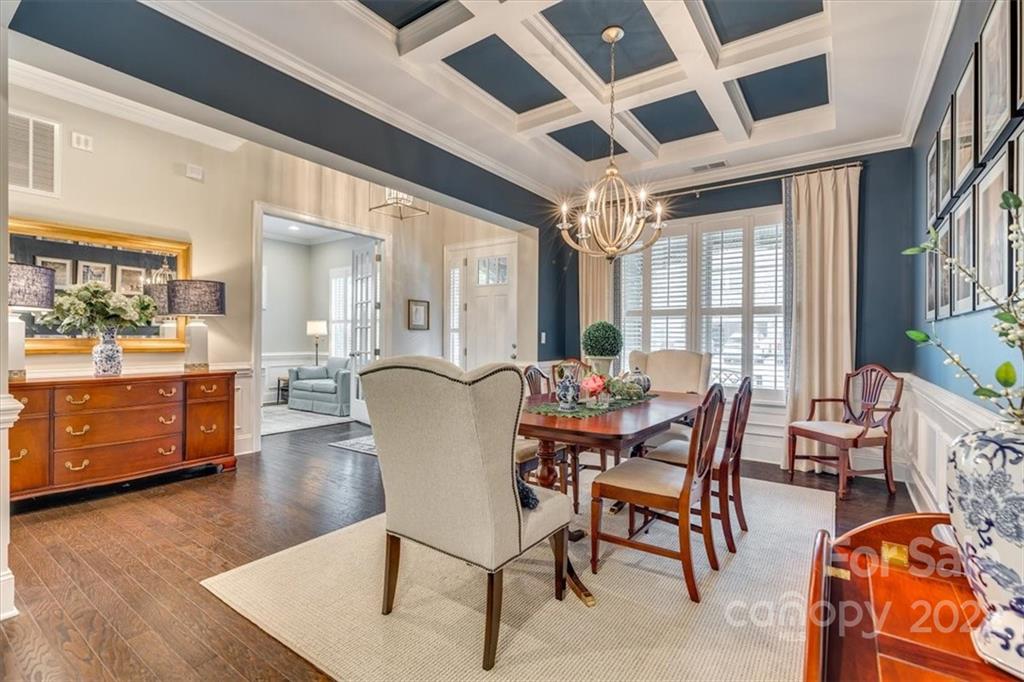 1489 Afton Way Fort Mill, SC 29708 - Photo 9 of 48 a dining room with furniture and wooden floor