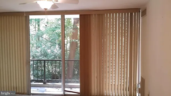 a view of a glass door and porch