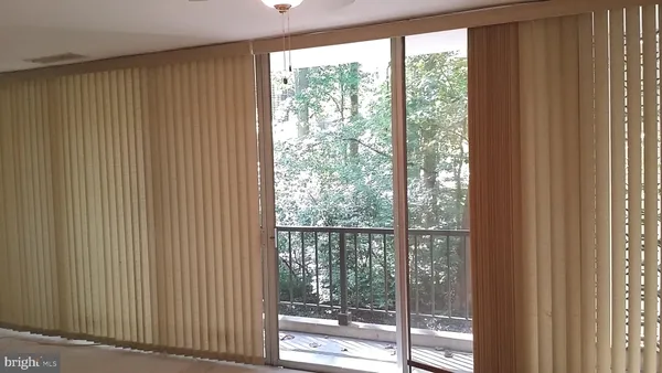 an empty room with an entrance door