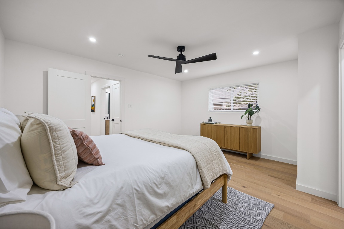 4609 Cliffstone Cove Austin, TX 78735 - Photo 22 of 33 Bedroom with recessed lighting, a ceiling fan, and light wood-type flooring