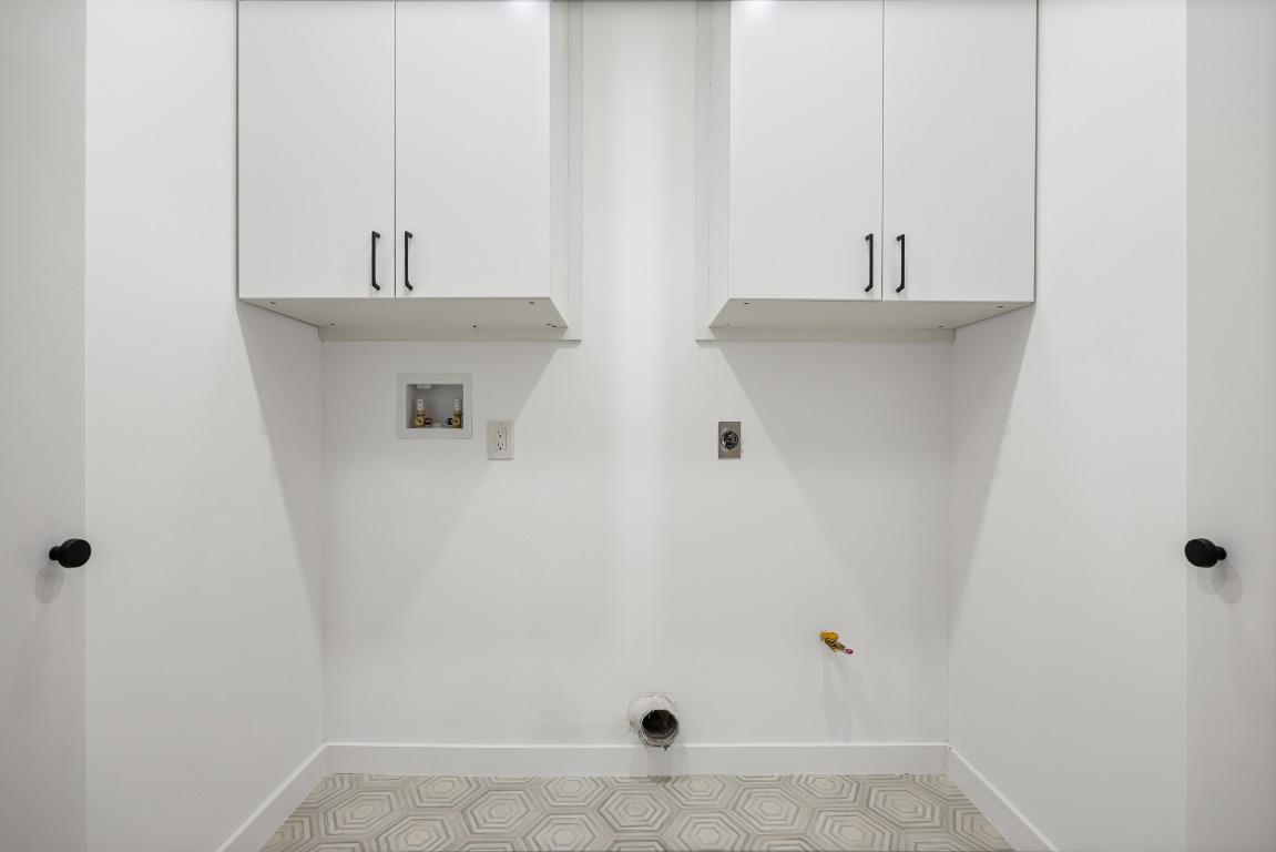 4609 Cliffstone Cove Austin, TX 78735 - Photo 27 of 33 Washroom with cabinet space, hookup for a washing machine, and electric dryer hookup