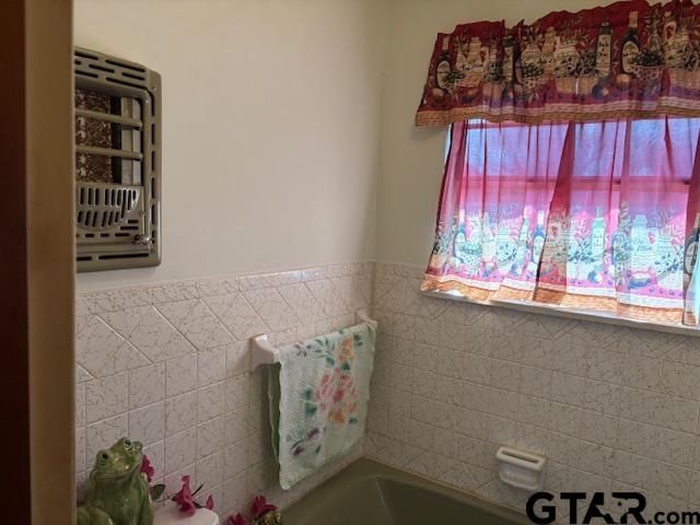 152 County Road 2131 Rusk, TX 75785 - Photo 16 of 43 a view of storage and utility room with a window