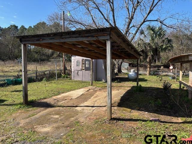 152 County Road 2131 Rusk, TX 75785 - Photo 22 of 43 a view of a backyard of the house