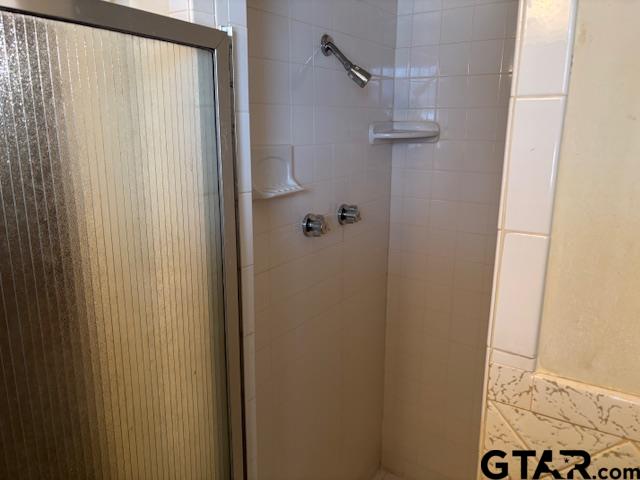 152 County Road 2131 Rusk, TX 75785 - Photo 23 of 43 a bathroom with a shower