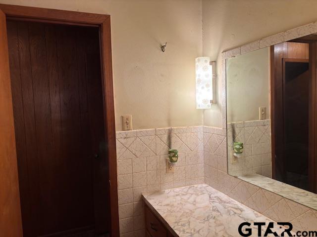 152 County Road 2131 Rusk, TX 75785 - Photo 26 of 43 a bathroom with a granite countertop shower and a sink