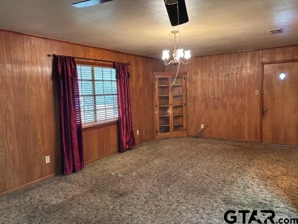 a view of a livingroom with a chandelier