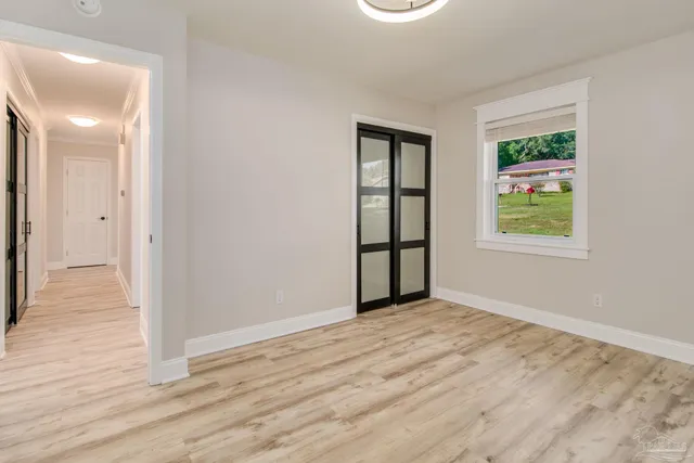 a view of an empty room and window