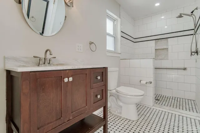 a view of a room with a wooden floor