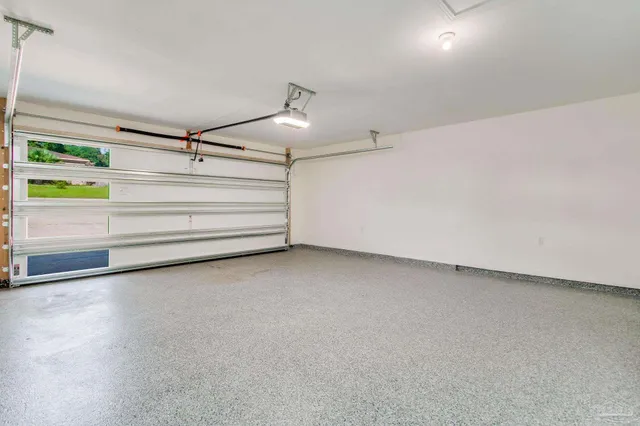 a view of a forest with a houses