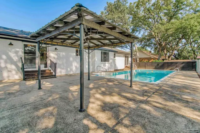 a view of a house with a park