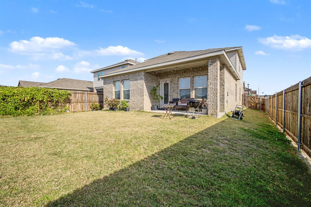 1301 Draper Lane Forney, TX 75126 - Photo 32 of 33 a view of a house with a outdoor space