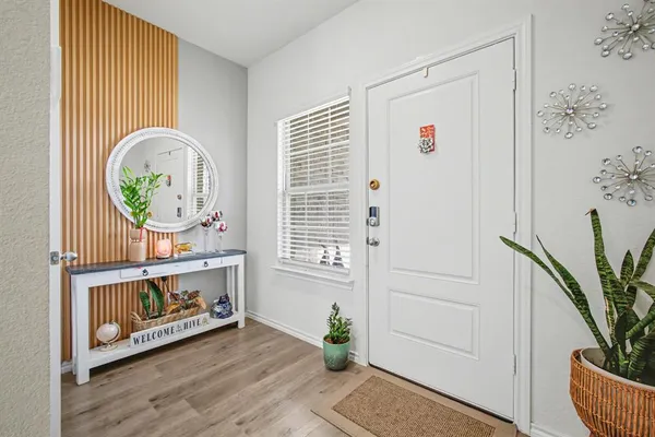 a view of livingroom with furniture and cabinet