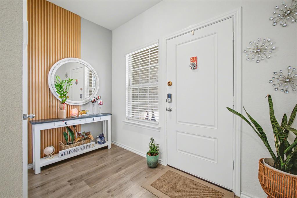 1301 Draper Lane Forney, TX 75126 - Photo 5 of 33 a view of livingroom with furniture and cabinet