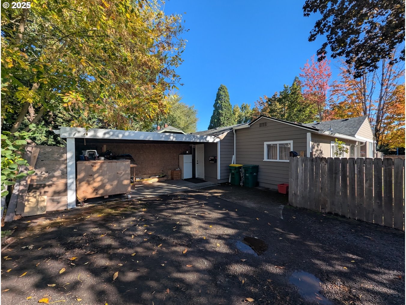 12025 Southwest 9th Street Beaverton, OR 97005 - Photo 1 of 22 a view of a house with a yard
