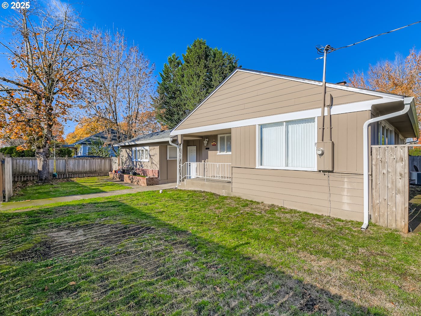 12025 Southwest 9th Street Beaverton, OR 97005 - Photo 15 of 22 a view of a house with a yard